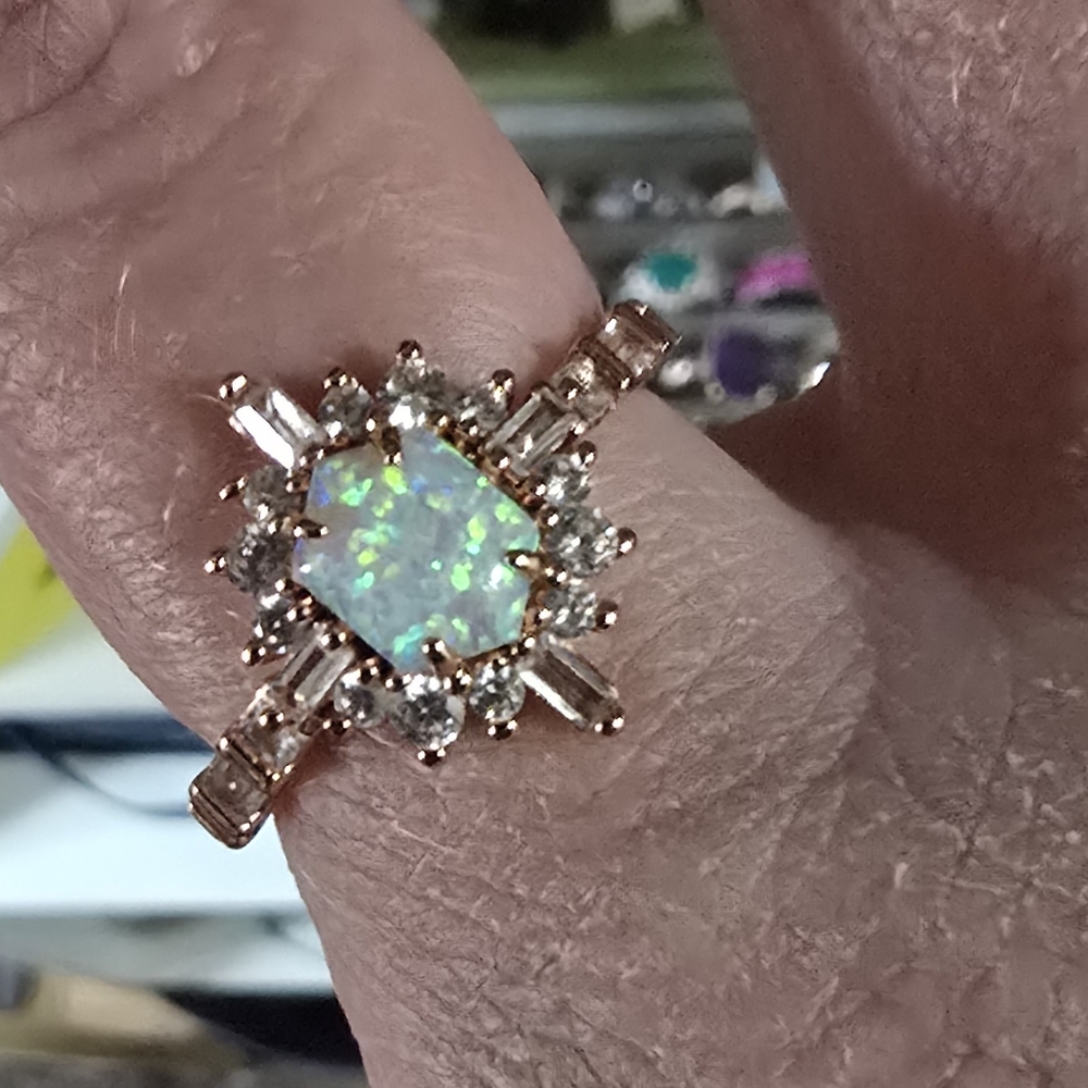 Elegant Opal and Diamond Ring